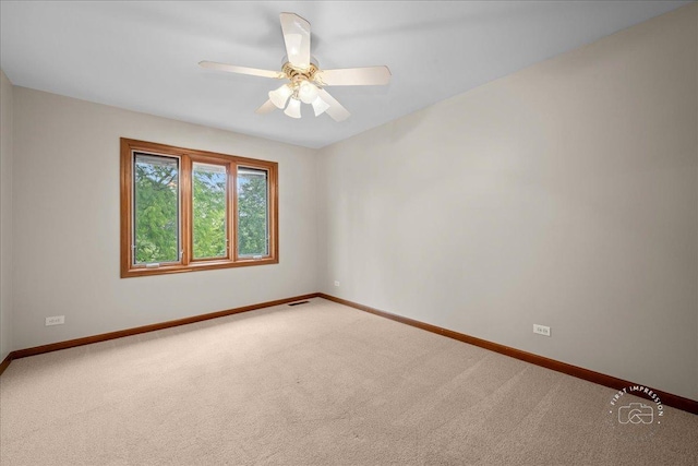 560 Braemar Ave, Naperville, IL 60563 - carpeted empty room with baseboards and ceiling fan