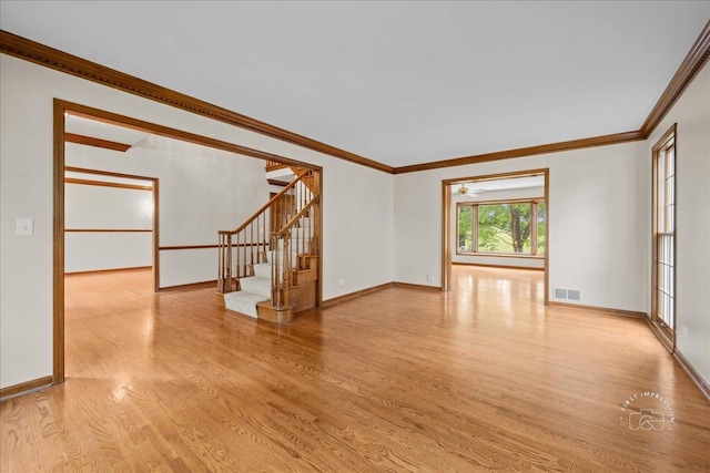 560 Braemar Ave, Naperville, IL 60563 - unfurnished room with stairway, light wood finished floors, and ornamental molding