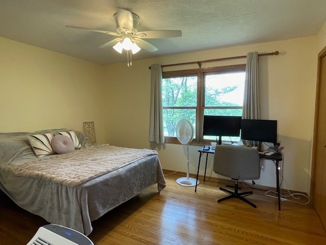 1181 Golf Ct, Dekalb, IL 60115 - bedroom with wood finished floors and a ceiling fan