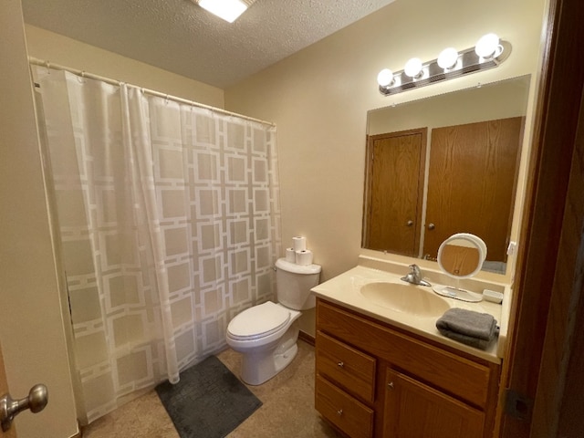 1181 Golf Ct, Dekalb, IL 60115 - bathroom with vanity, toilet, a shower with curtain, and a textured ceiling