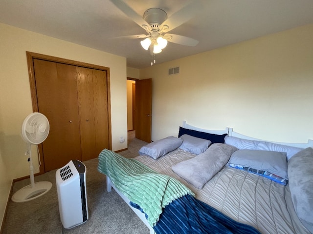 1181 Golf Ct, Dekalb, IL 60115 - bedroom with carpet flooring, a closet, and ceiling fan
