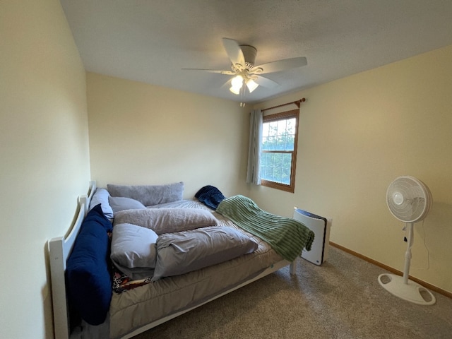 1181 Golf Ct, Dekalb, IL 60115 - carpeted bedroom featuring baseboards and a ceiling fan