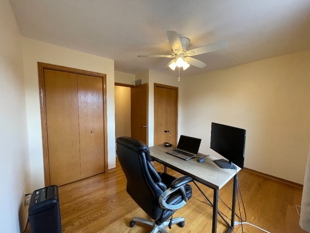 1181 Golf Ct, Dekalb, IL 60115 - office space featuring a ceiling fan, light wood finished floors, and baseboards