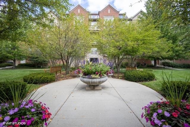 1950 Farnsworth Ln Unit 207, Northbrook, IL 60062 - view of home's community with a patio and a yard