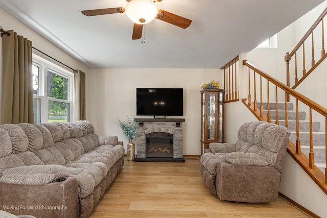 150 Meadows Ct, Sugar Grove, IL 60554 - living room featuring light wood-type flooring, ceiling fan, and stairway