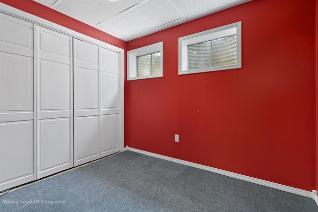 150 Meadows Ct, Sugar Grove, IL 60554 - unfurnished bedroom with carpet flooring, a drop ceiling, a closet, and baseboards