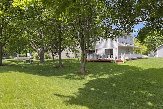 150 Meadows Ct, Sugar Grove, IL 60554 - view of green lawn featuring a deck