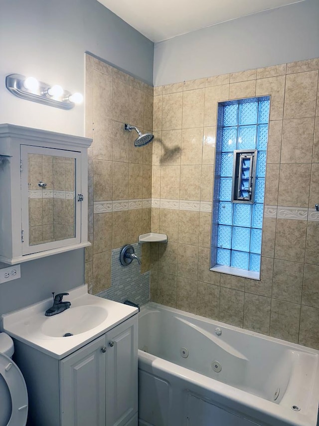 6529 S Laflin St, Chicago, IL 60636 - full bathroom featuring toilet, vanity, and a combined bath / shower with jetted tub