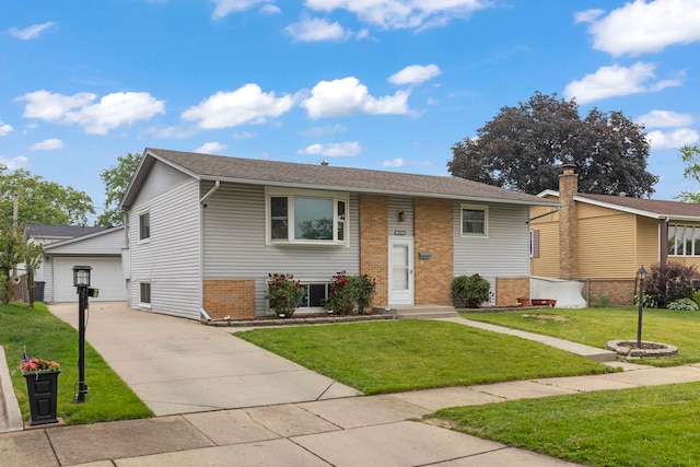 15424 David Ln, Oak Forest, IL 60452 - view of front facade with brick siding, a front lawn, and an outdoor structure