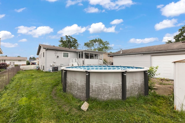 15424 David Ln, Oak Forest, IL 60452 - rear view of house featuring a sunroom
