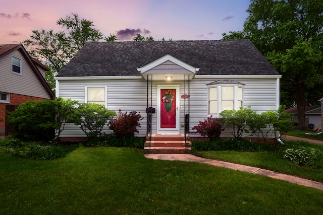 229 N Marion Ave, Bartlett, IL 60103 - view of front of property with roof with shingles and a lawn