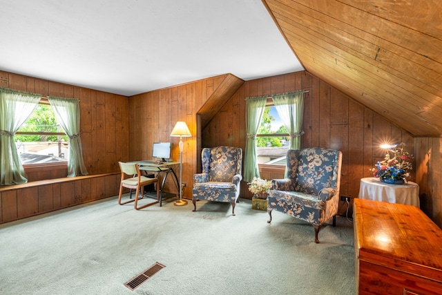 229 N Marion Ave, Bartlett, IL 60103 - sitting room featuring plenty of natural light, carpet, lofted ceiling, and wood walls