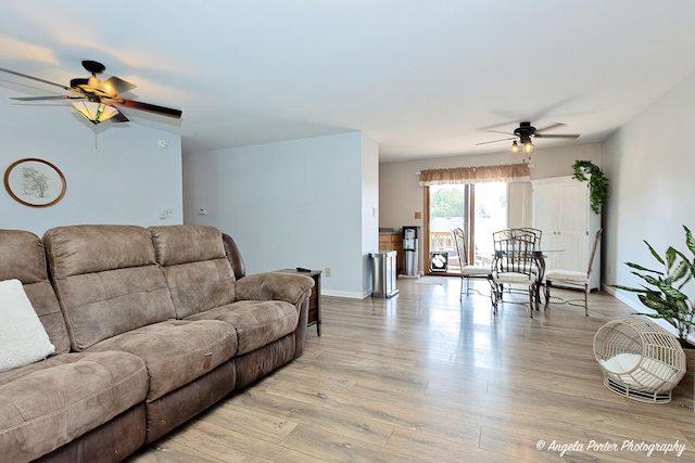 1503 Channel Beach Ave, Johnsburg, IL 60051 - living area featuring a ceiling fan, light wood finished floors, and baseboards