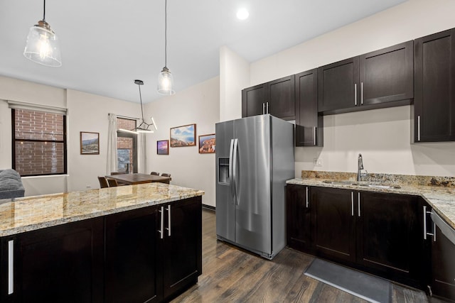2150 W N Ave Unit 4, Chicago, IL 60647 - kitchen with stainless steel refrigerator with ice dispenser, a sink, dark wood-type flooring, and light stone counters