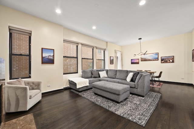 2150 W N Ave Unit 4, Chicago, IL 60647 - living room with wood finished floors, a chandelier, baseboards, and recessed lighting