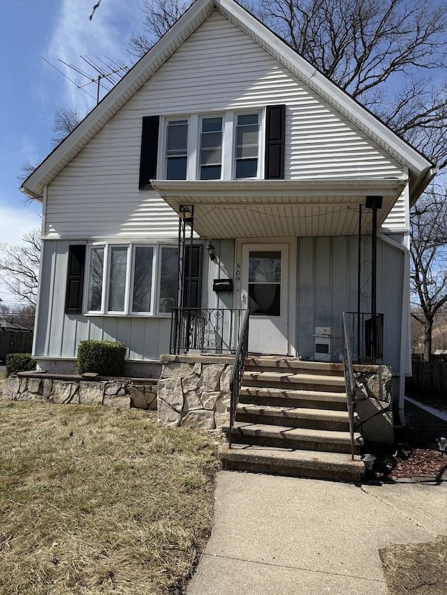 509 S May St, Joliet, IL 60436 - bungalow with board and batten siding and a porch