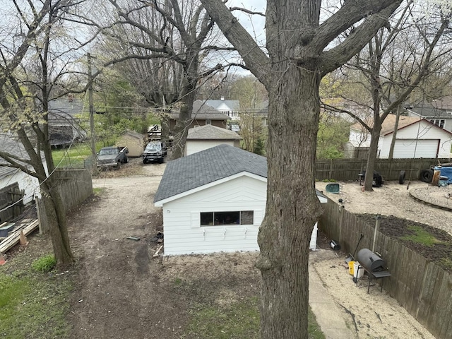 509 S May St, Joliet, IL 60436 - view of home's exterior featuring a shingled roof