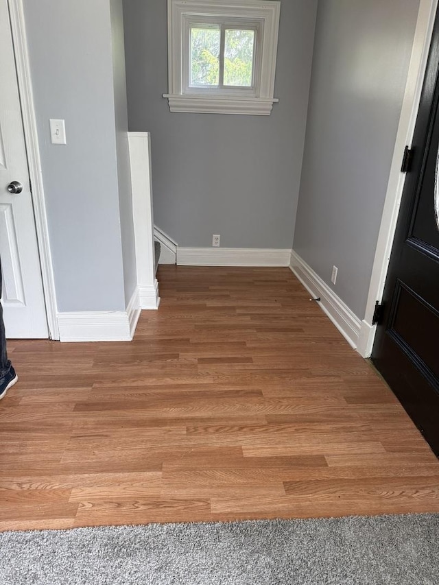 509 S May St, Joliet, IL 60436 - spare room with wood finished floors and baseboards
