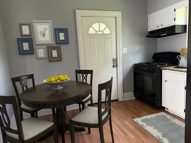 509 S May St, Joliet, IL 60436 - dining area with light wood-style floors and baseboards