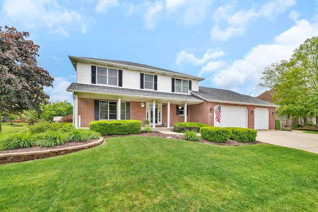 605 Feeney Dr, Minooka, IL 60447 - traditional home featuring brick siding, driveway, an attached garage, a front yard, and a porch