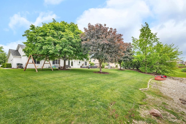 605 Feeney Dr, Minooka, IL 60447 - view of green lawn featuring a playground