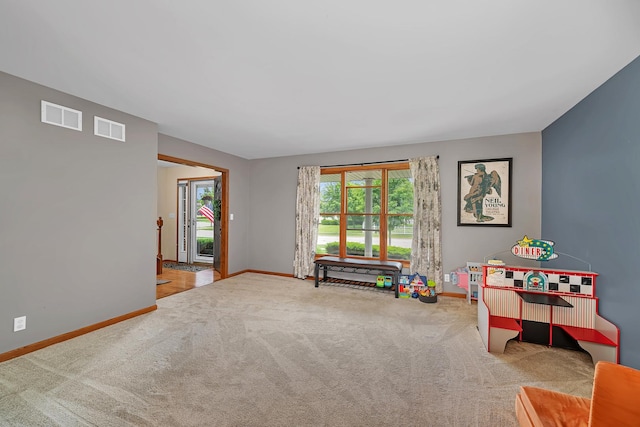 605 Feeney Dr, Minooka, IL 60447 - rec room with baseboards and carpet floors