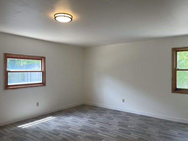 3400 N Buffalo Grove Rd, Arlington Heights, IL 60004 - unfurnished room with dark wood-type flooring and baseboards