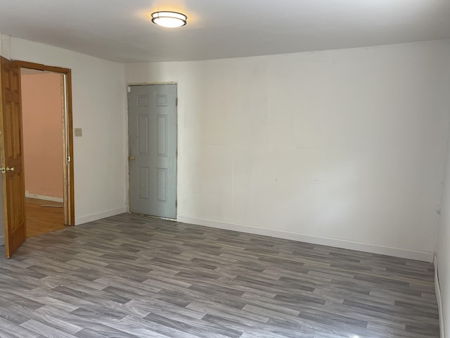 3400 N Buffalo Grove Rd, Arlington Heights, IL 60004 - unfurnished room featuring wood finished floors and baseboards