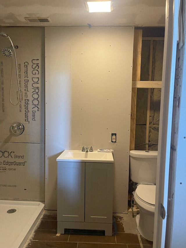 3400 N Buffalo Grove Rd, Arlington Heights, IL 60004 - bathroom with a shower stall, toilet, and vanity