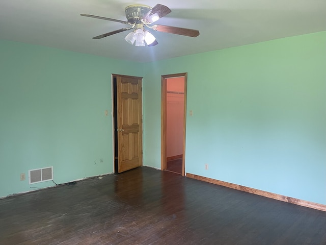 3400 N Buffalo Grove Rd, Arlington Heights, IL 60004 - spare room featuring wood finished floors, a ceiling fan, and baseboards