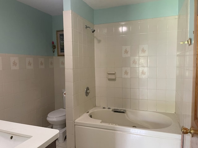 3400 N Buffalo Grove Rd, Arlington Heights, IL 60004 - bathroom featuring tile walls, toilet, shower / washtub combination, and vanity