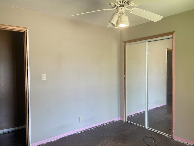 3400 N Buffalo Grove Rd, Arlington Heights, IL 60004 - unfurnished bedroom featuring a closet, dark wood finished floors, a ceiling fan, and baseboards