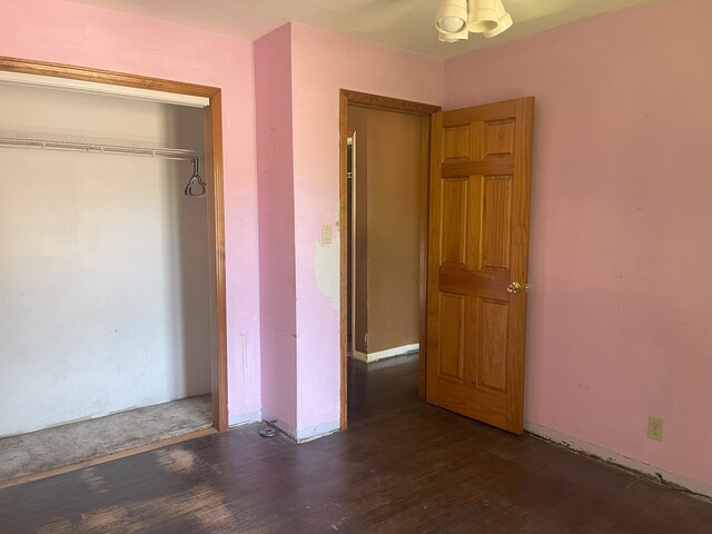 3400 N Buffalo Grove Rd, Arlington Heights, IL 60004 - unfurnished bedroom featuring wood finished floors and a closet