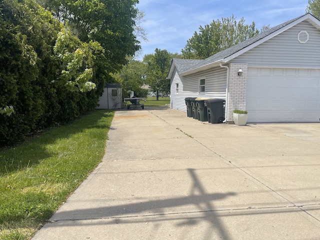 3400 N Buffalo Grove Rd, Arlington Heights, IL 60004 - view of property exterior with a garage, brick siding, and a shingled roof