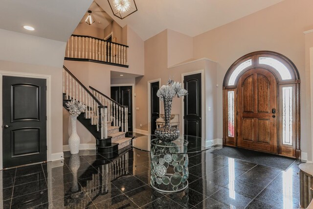 45 Silo Ridge Rd, Orland Park, IL 60467 - foyer featuring baseboards, granite tiled floors, a towering ceiling, and stairway