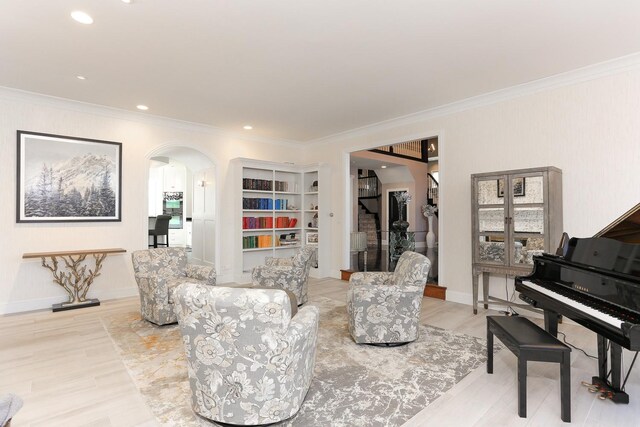 45 Silo Ridge Rd, Orland Park, IL 60467 - living area with arched walkways, ornamental molding, light wood-style flooring, stairway, and recessed lighting