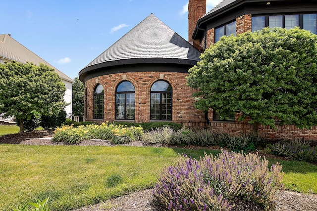 45 Silo Ridge Rd, Orland Park, IL 60467 - view of property exterior featuring brick siding, a yard, and a chimney