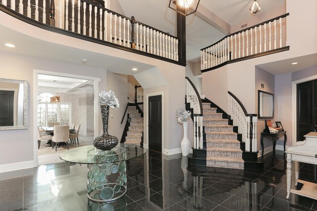 45 Silo Ridge Rd, Orland Park, IL 60467 - foyer entrance with stairs, a high ceiling, granite floors, and recessed lighting