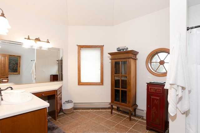 45 Silo Ridge Rd, Orland Park, IL 60467 - bathroom featuring vanity, a baseboard heating unit, and tile patterned flooring