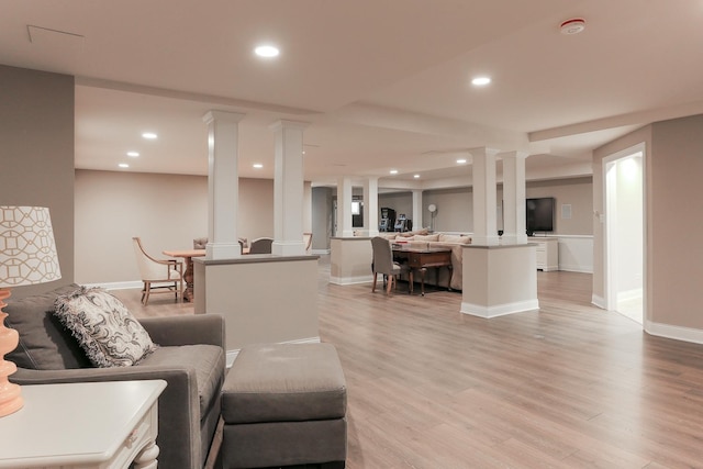 45 Silo Ridge Rd, Orland Park, IL 60467 - living area with ornate columns, light wood-style floors, and recessed lighting