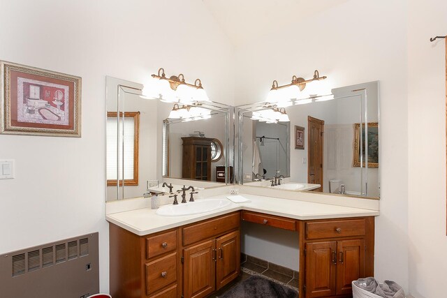 45 Silo Ridge Rd, Orland Park, IL 60467 - full bath with radiator, lofted ceiling, vanity, and tile patterned flooring