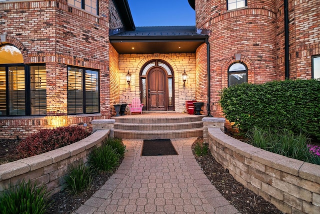 45 Silo Ridge Rd, Orland Park, IL 60467 - doorway to property featuring brick siding and a porch
