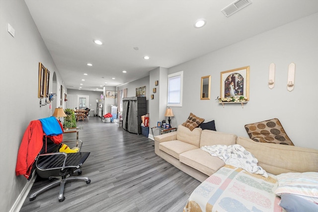 8543 S Burley Ave, Chicago, IL 60617 - living room featuring wood finished floors, recessed lighting, and baseboards
