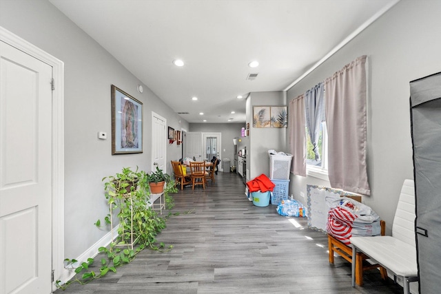 8543 S Burley Ave, Chicago, IL 60617 - rec room with wood finished floors, recessed lighting, and baseboards