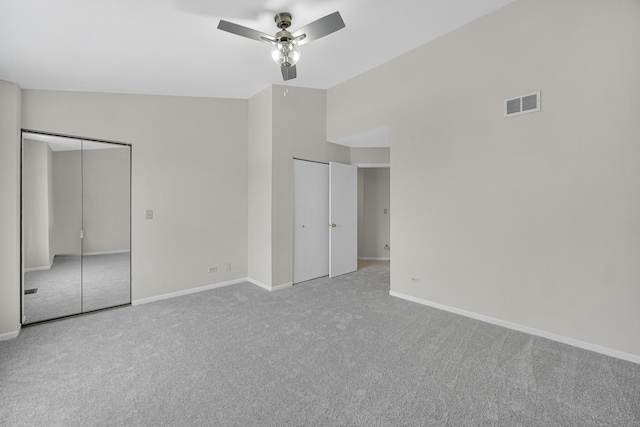 653 Fairview Ln, South Elgin, IL 60177 - unfurnished bedroom featuring two closets, carpet flooring, baseboards, and a ceiling fan