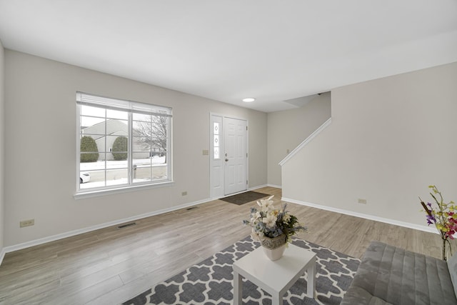 653 Fairview Ln, South Elgin, IL 60177 - entrance foyer with wood finished floors, stairs, and baseboards
