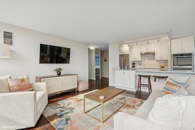 345 W Fullerton Pkwy Unit 601, Chicago, IL 60614 - living room with dark wood finished floors and baseboards