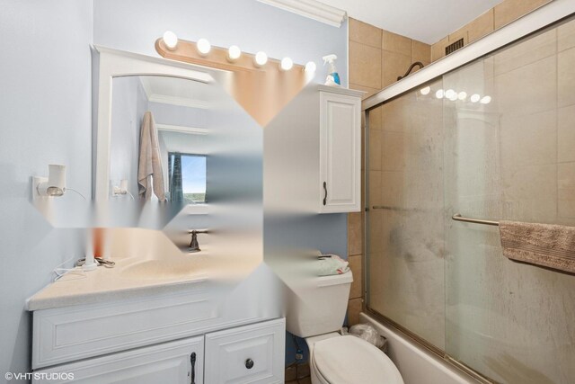 1636 N Wells St Unit 2601, Chicago, IL 60614 - bathroom with vanity, shower / bath combination with glass door, toilet, and crown molding