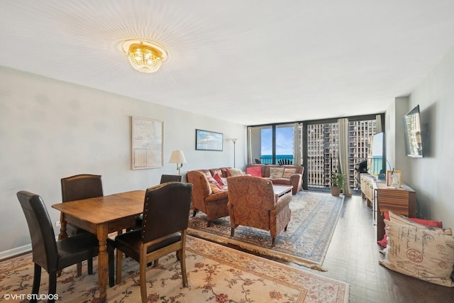 1636 N Wells St Unit 2601, Chicago, IL 60614 - dining space with wood finished floors and floor to ceiling windows