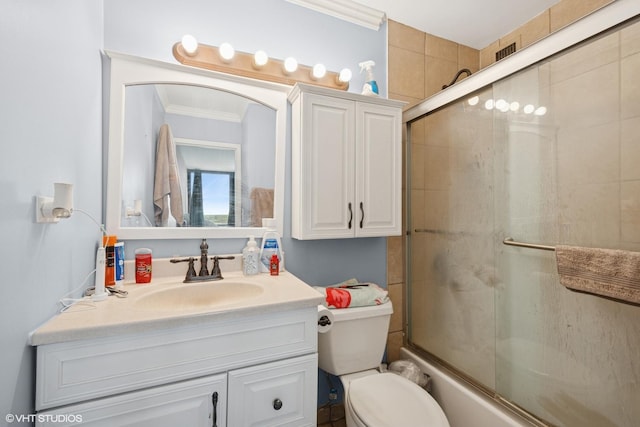 1636 N Wells St Unit 2601, Chicago, IL 60614 - full bath featuring bath / shower combo with glass door, vanity, ornamental molding, and toilet